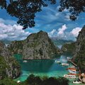 lagoon mountains and boats