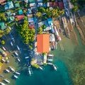 outriggers next to village