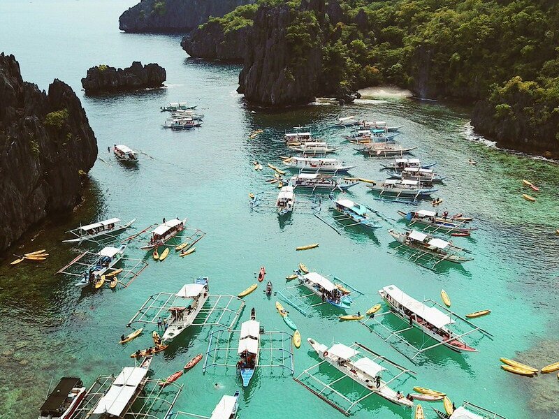 lagoon full with outriggers