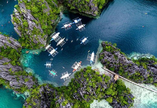 aerial view of outriggers moored close together