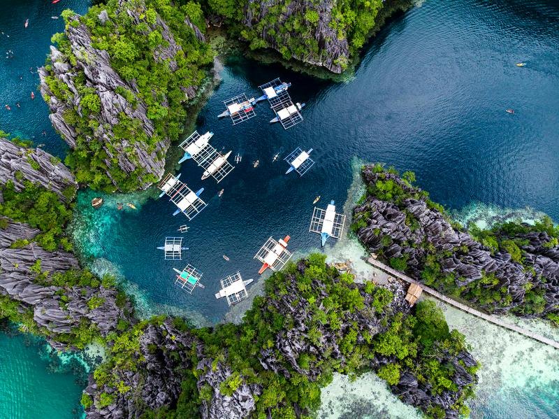aerial view of outriggers moored close together